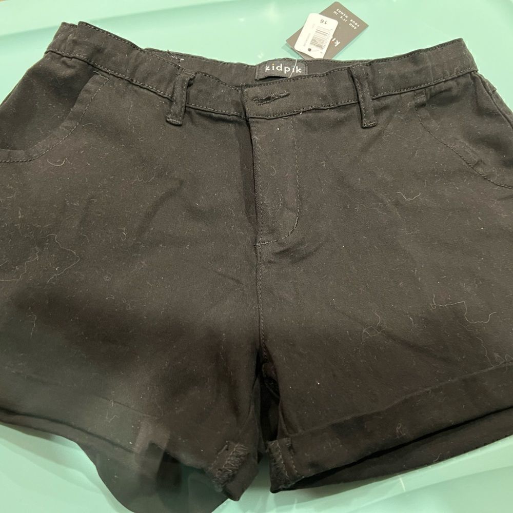 Girl’s stretch button closure shorts